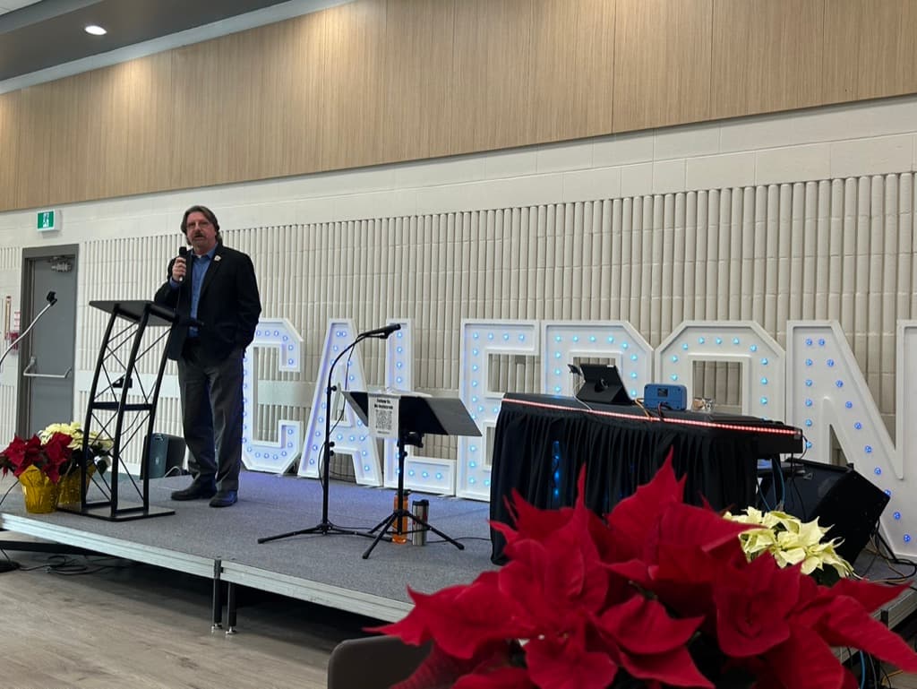 Doug Maskell speaking at a Caledon community event